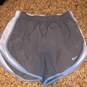 Grey and light blue Nike shorts